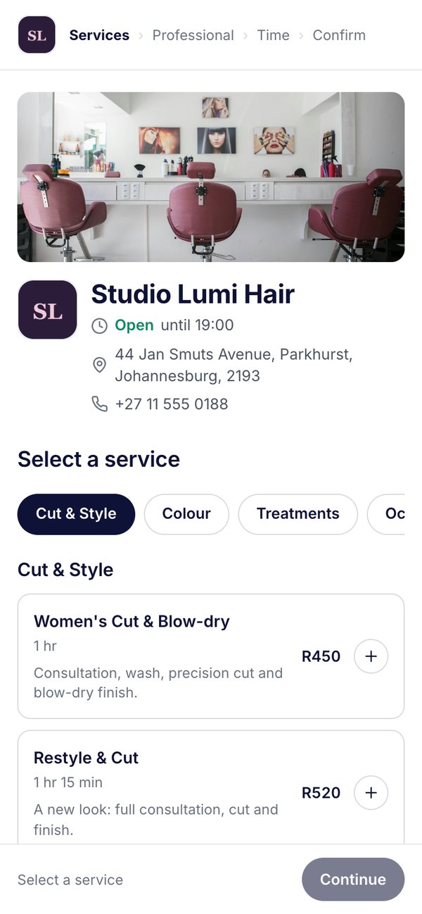 A booking page for a hair salon on a phone